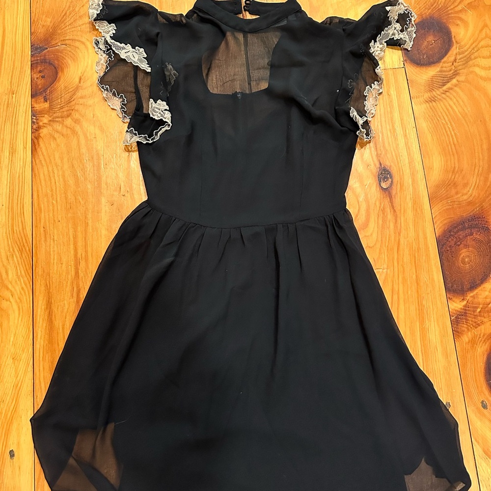 Elegant Black Mini Dress with Lace Accents
